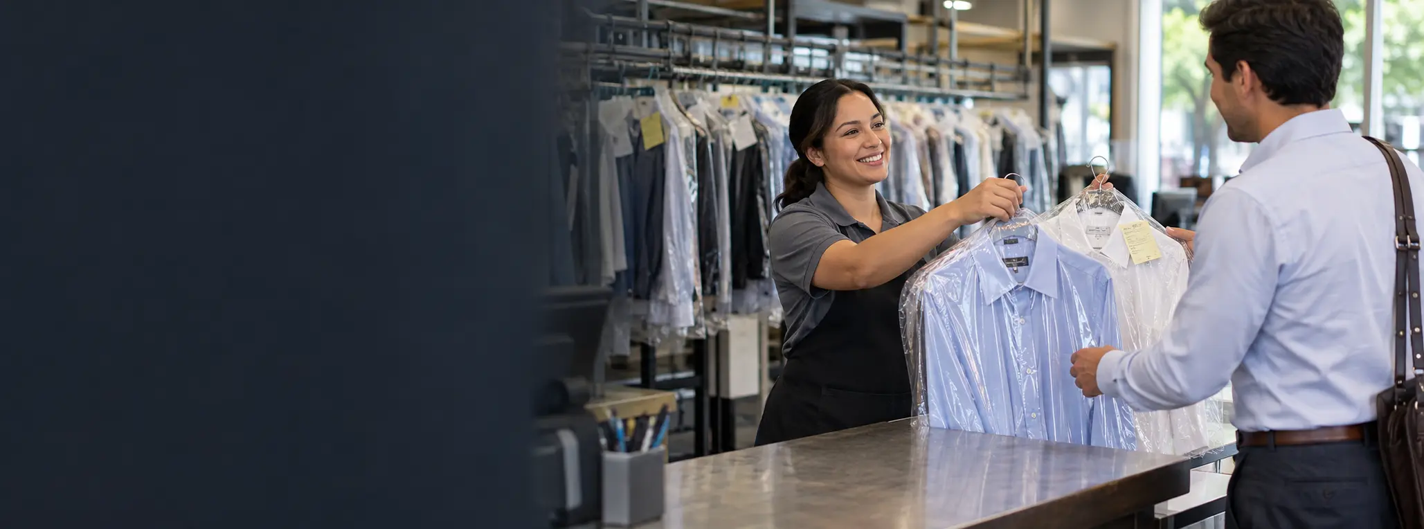 Freshly pressed shirts being returned at a neighborhood dry cleaner